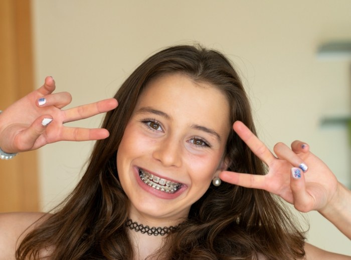 Young dental patient with healthy smile thanks to pediatric cosmetic dentistry