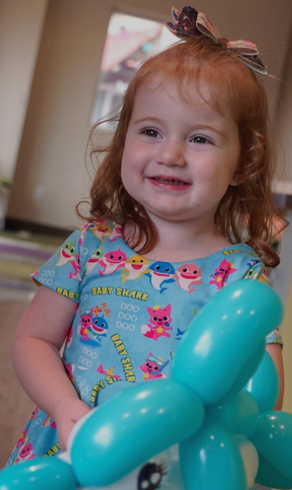 Child smiling while visiting a pediatric dentist in Bastrop Texas