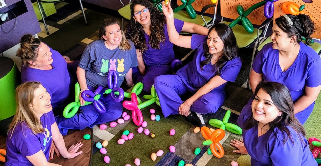 The friendly pediatric dental team in dental office