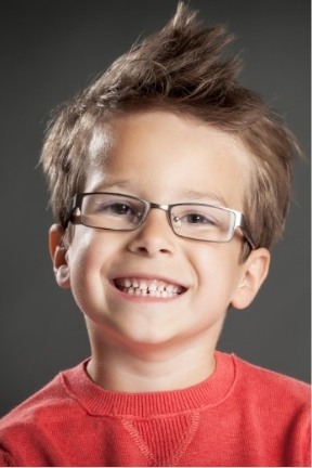 Child smiling after preventive dentistry visit
